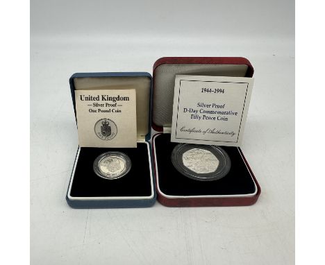 2x silver coins, a 1944-1994 silver proof D-Day Commemorative 50p coin, a siver proof Â£1 coin