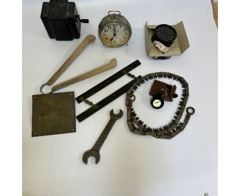 A military saw, gas mask and a volt box and other items