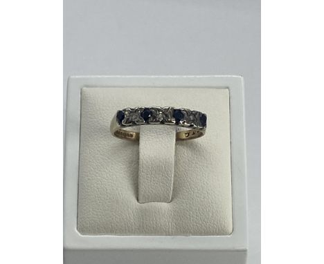 A 9ct yellow gold sapphire and diamond ring, size M 1/2, 2.3 grams in weight approx