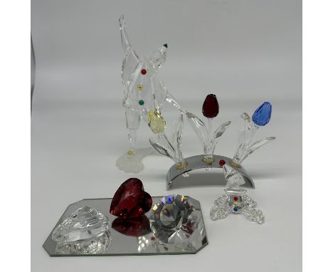 A collection of Swarovski crystal clown, flowers, small clown