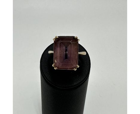 A 9ct yellow gold amethyst dress ring, large size stone, weight 8.2 grams approx, other shank is a spare, size R