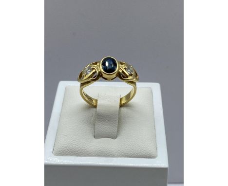 An 18ct yellow gold sapphire &amp; diamond dress ring, 4.6 grams approx weight, size M
