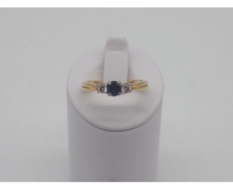 An 18ct yellow gold sapphire + diamond 3 stone ring, size M, weight approx 3.7g, nice condition