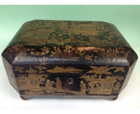 A Chinese export lacquer tea caddy. Gilt decoration of figures and pavilions. Interior fitted with three pewter covered canis