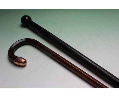 A gentleman’s 9ct gold mounted coromandel walking stick together with an ebony octagonal walking stick. (2)