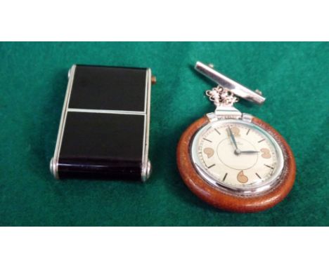 An Art Deco Cyma travelling watch. With black enamel case. Together with a Swiss cord leather bound fob watch. (2)