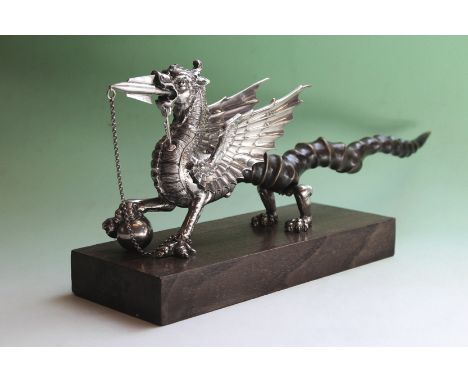 The Welsh Dragon trophy table lighter c.1937 by Walker and Hall inscribed Ye Dragon of Wantley with twisted horn tail. 45cm l