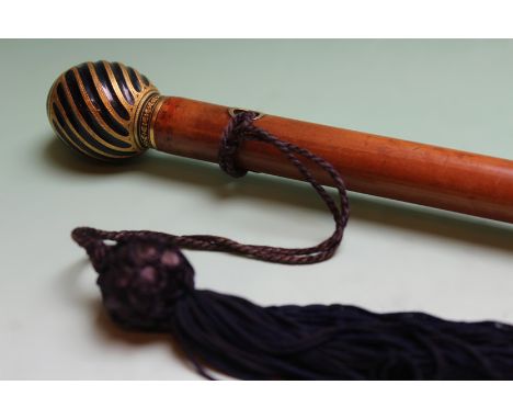 A late 19th Century Malacca walking cane with Toledo dragon design to wrythen finial. 85cm long.
