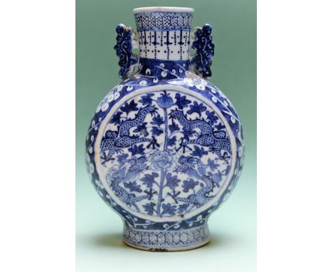 A Chinese blue and white moon flask with dragon designs. 21cm high. A blue and white baluster vase and cover with dog of fo f