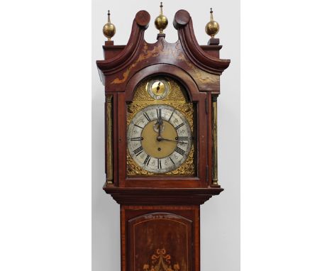 An early 20th Century mahogany and inlaid longcase clock. 3 train 8 day movement chiming on 8 bells. With arched brass dial a