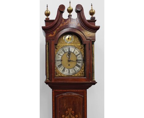 An early 20th Century mahogany and inlaid longcase clock. 3 train 8 day movement chiming on 8 bells. With arched brass dial a