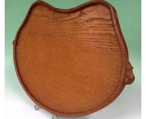 A Mouseman light oak cheese tray. 47 x 32cm.