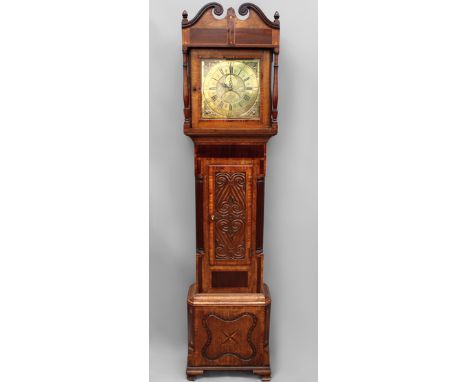 A 19th Century longcase clock. Thirty hour movement with engraved brass dial. Signed Joseph Halifax, Barnsley. In associated 