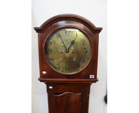 An early 19th Century mahogany longcase clock with circular brass dial. Eight day movement. RACINE. 196cm high.