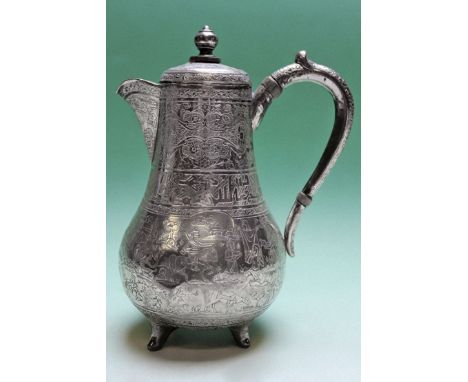 A late 19th Century silver coloured metal coffee pot decorated with figure on horseback. Possibly of Russian origin. 19cm hig