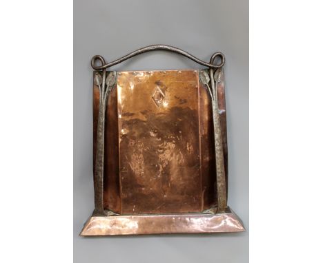 An Arts and Crafts wrought iron and copper fire screen. Scrolling leaf form surround. 68cm high. 62cm wide.