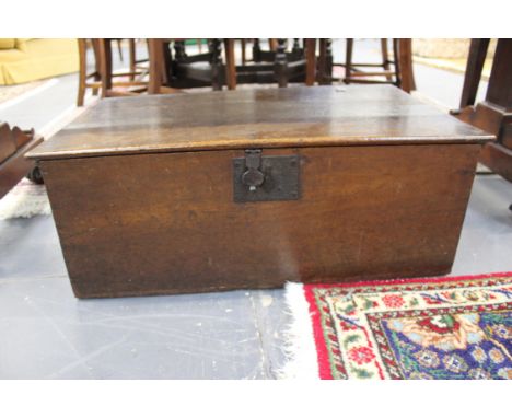 An unusual walnut and elm trunk with wrought iron lock and hinges.