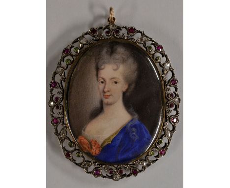 A diamond, peridot, spinel and ruby framed oval portrait miniature pendant, oval watercolour portrait of a lady wearing blue 