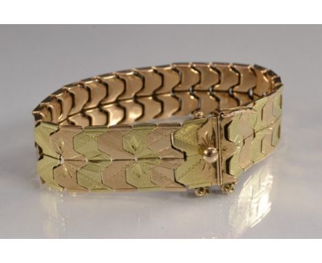 An Italian 14ct yellow and rose gold alternating articulated engraved panel bracelet, stamped 585 to compression clasp, indis