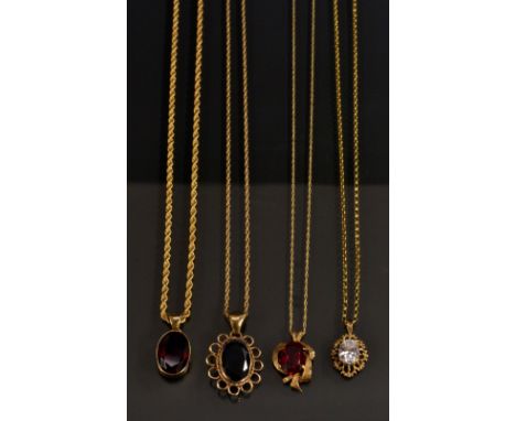 A vibrant blue oval synthetic spinel pendant necklace, yellow metal frame (tests as 9ct gold), fine link chain;  others synth