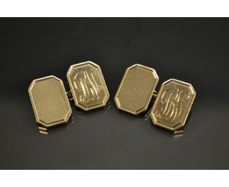 A pair of 9ct gold canted rectangular cufflinks, engine turned and monogrammed platform terminals, John Henry Wynn, Birmingha