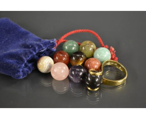 A far eastern gems ltd mood ring, with ten interchangeable different gem stone globular beads inc amethyst, Tigers-eye, avent