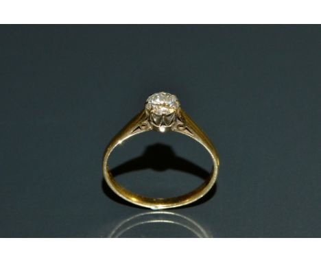 A diamond solitaire ring, round brilliant cut approx 0.50ct, white metal crown claw, 18ct gold shank, size P, London 1988, 2.