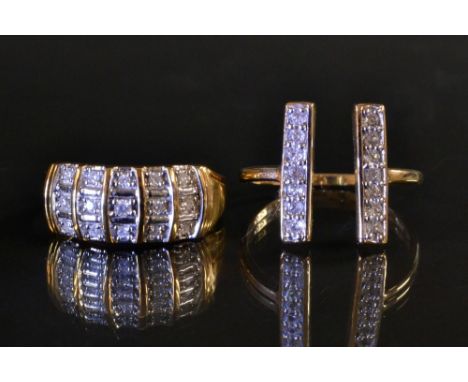 A fifteen stone diamond panel ring, each round brilliant cut, arched bar ridges, tapering shoulders, 9ct gold shank, size N/O