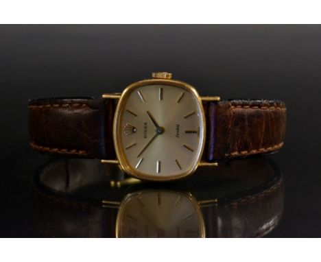 Rolex - a lady's 18ct gold 2673 Orchid wristwatch, champagne cushion dial, block batons, manual wind 1400 cal movement, 18ct 