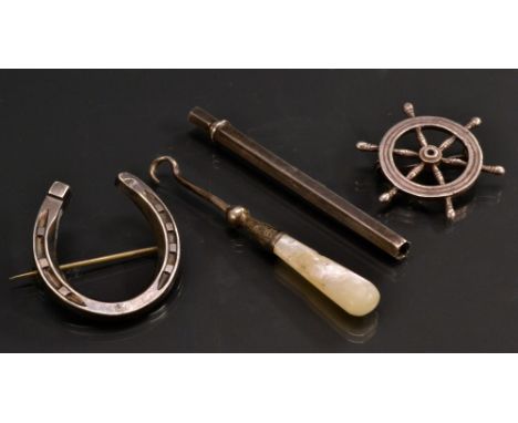 Jewellery - a silver ships wheel brooch, London 1977;  another horseshoe, Birmingham 1889;  a silver cased pencil Birmingham 