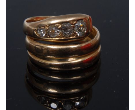 A gentleman's diamond snake ring,  coiled snake band inset with four graduating diamonds, total estimated diamond weight appr