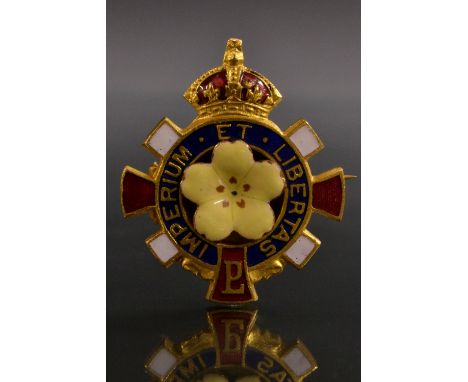 A British Army Imperium et Libertas enamelled pin badge, Rd 392238, 31mm high