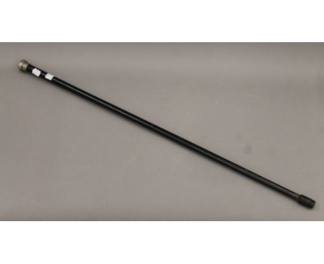 A silver-topped walking stick. 88 cm long.