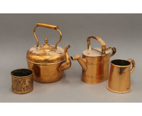 A collection of vintage copperware including a kettle, watering can etc. The former 30 cm high.