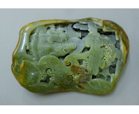 A Chinese jade boulder carving. 21 cm long.