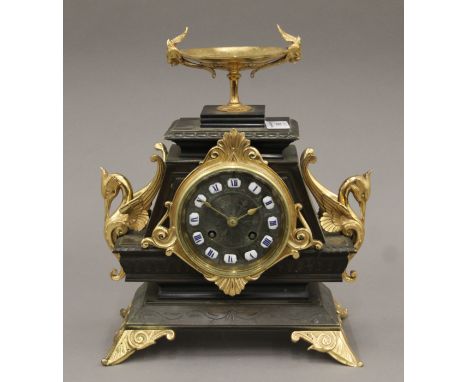 A 19th century bronze and ormolou mantle clock. 30 cm high.