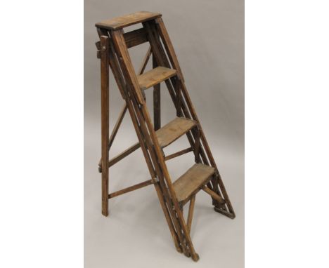 A vintage wooden step ladder. 101 cm high.