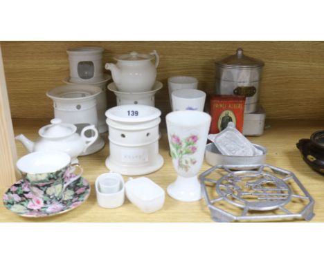 A quantity of French ceramic coffee warmers, etc