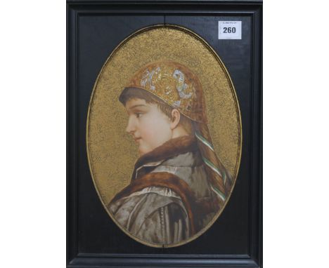A pair of Continental ceramic oval portrait plaques, 19th century, each painted in Renaissance style with textured gilt backg