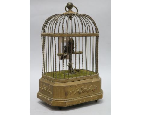 An automaton bird in a cage