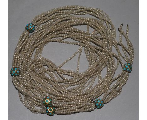 A multi strand seed pearl, yellow metal and turquoise set necklace, 116cm.