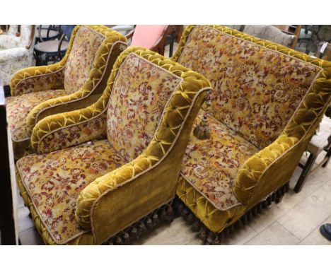 A Victorian three piece velvet covered sofa and a pair of armchairs, Sofa W.130cm