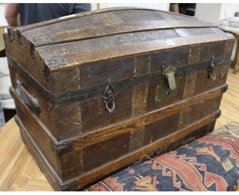 An early 20th century dome top steamer trunk W.83cm