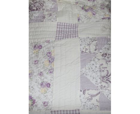 A double quilted bed spread