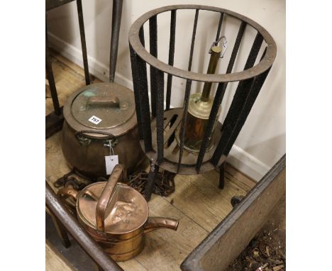 A 19th century copper pot, iron trivet and various wrought iron fire tools