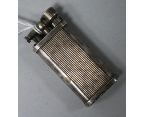 A Dunhill Unique lighter, 65mm.
