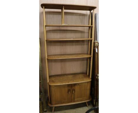 An Ercol elm room divider W.90cm