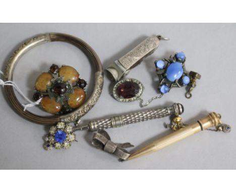 A Chinese rattan and white metal bangle, various hardstone brooches, paste jewellery, propelling pencils, etc.