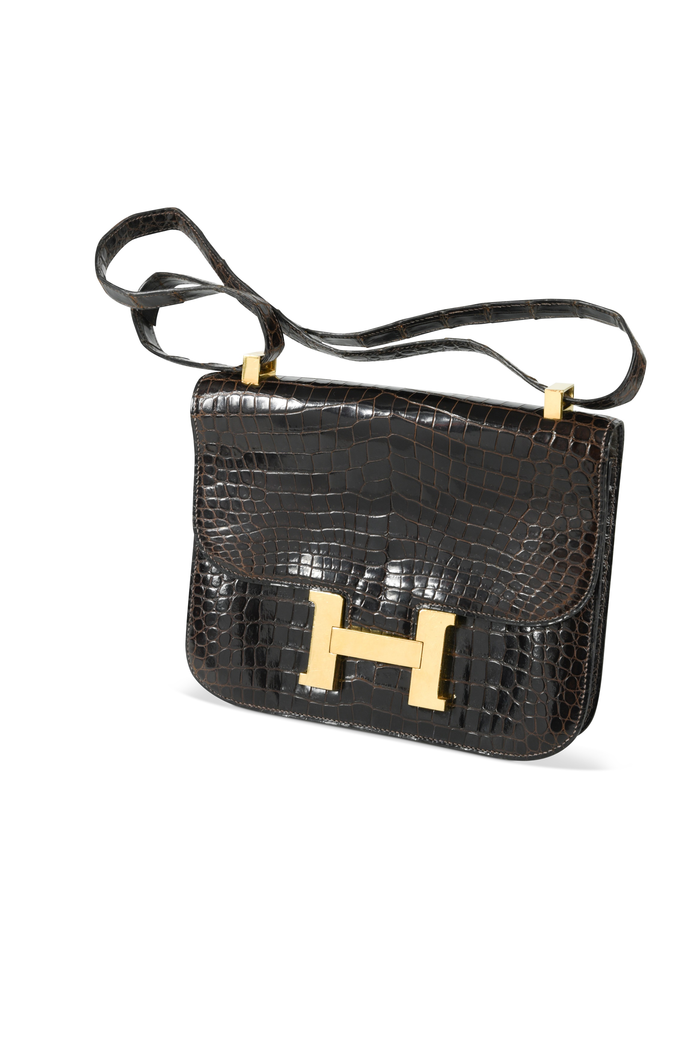 An Hermès brown crocodile leather Constance bag, in - Cheffins Fine Art