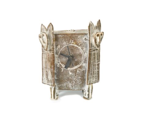§ John Maltby (British, 1936-2020), clock,a stoneware mantel clock with incised dial and mounted with two abstract figures, i